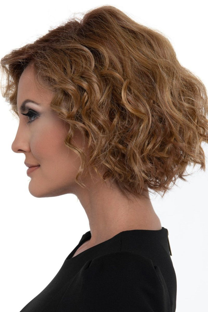 Women modeling a short curly style.