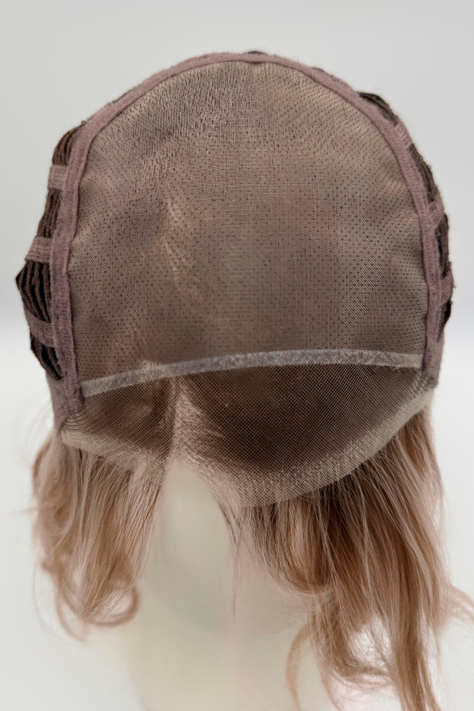 Cap Construction photo showing the extended lace front and monofilament top.