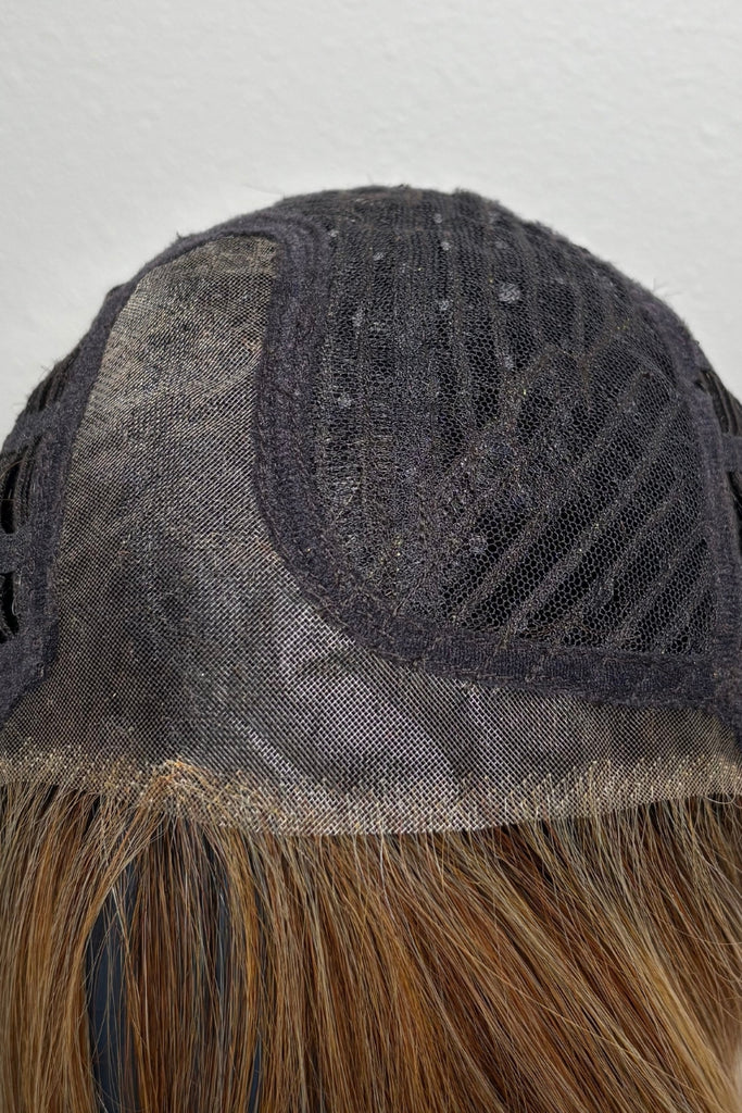 Cap construction showing the monofilament part and extended lace front.