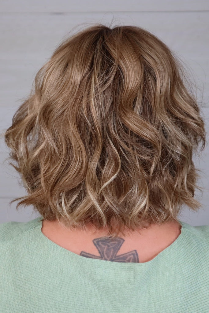 Back of model wearing the color Sunkissed Almond-R.