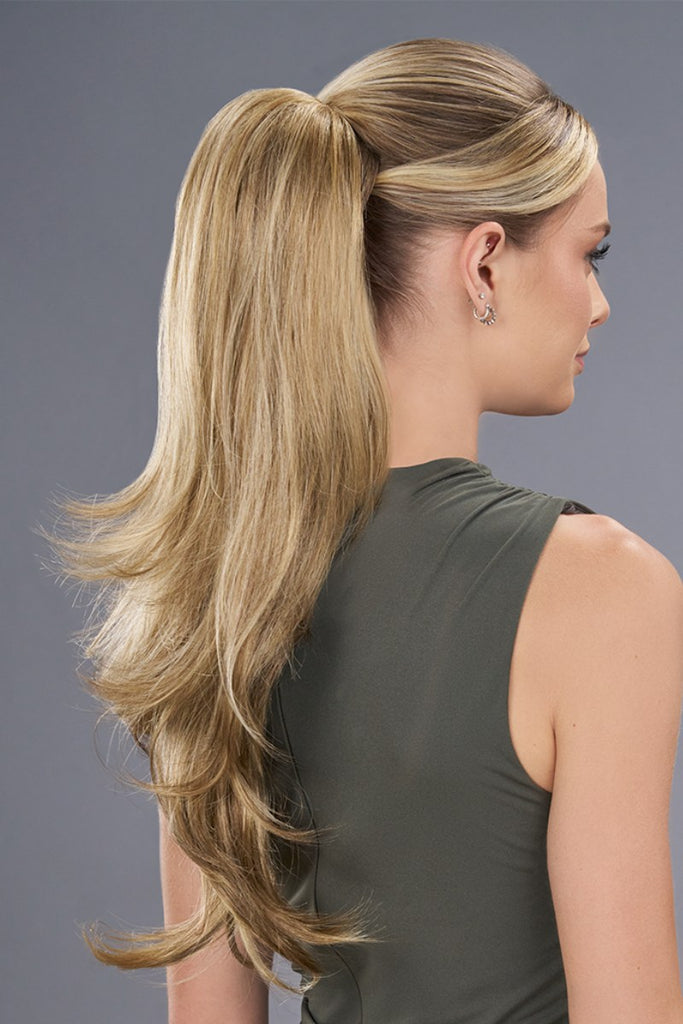 Side of model wearing a long wispy ponytail.