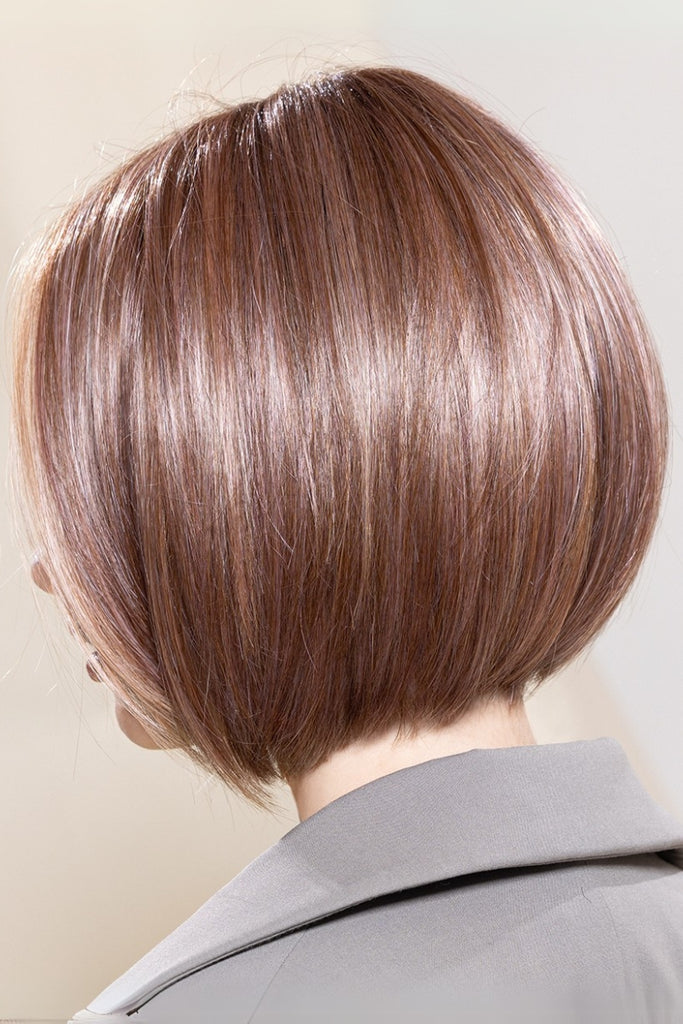 Back view of woman modeling a wig in the color Rosewood Brown Shaded.