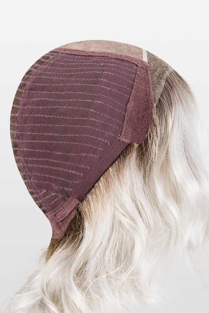 Side view of cap construction showing the extended lace front, monofilament top and closed wefted sides and back.