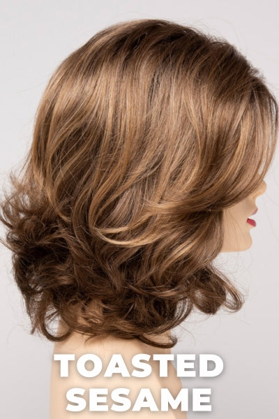 Color Swatch Toasted Sesame for Envy wig Jade.  Light brown base with wheat blonde and dark blonde highlights and a chestnut brown rooting.