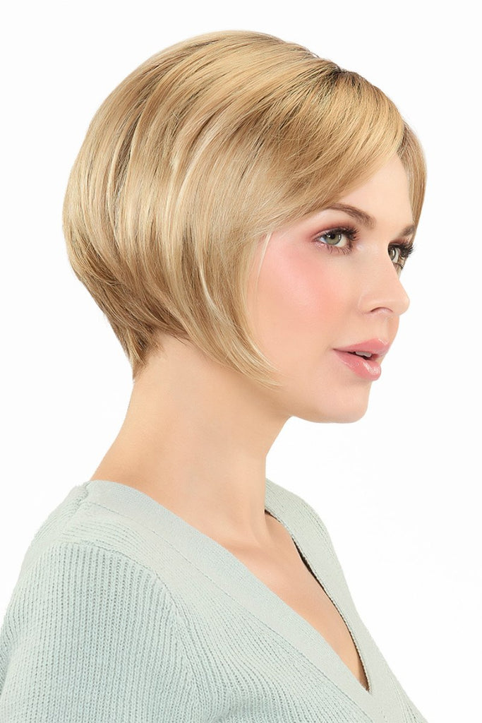 Model wearing a short pixie cut wig.