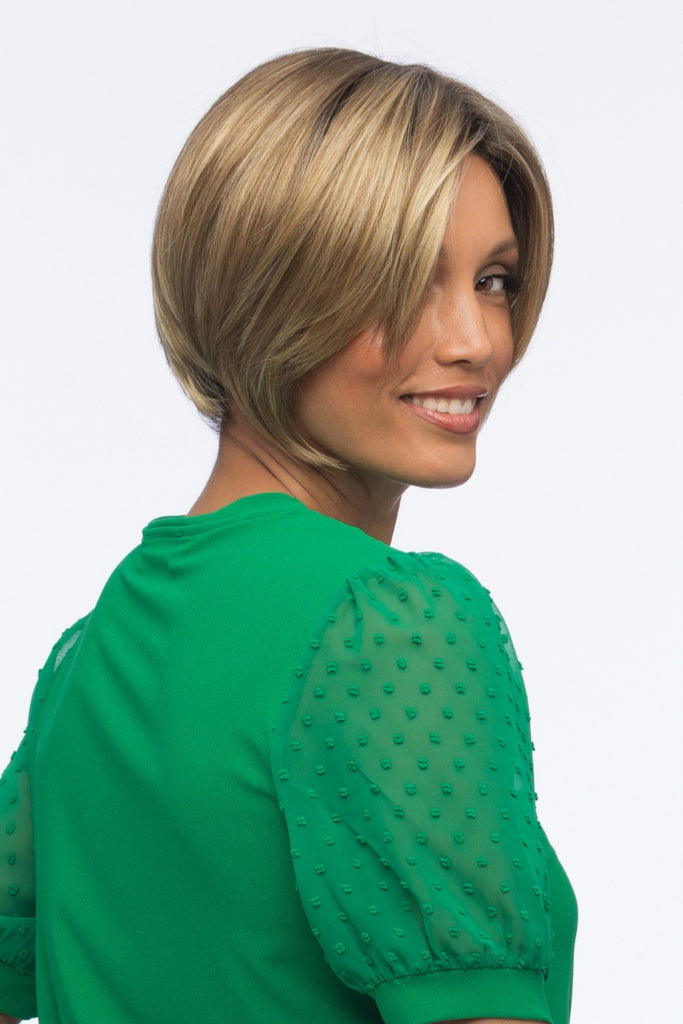 Side view of woman wearing a wig from Estetica.