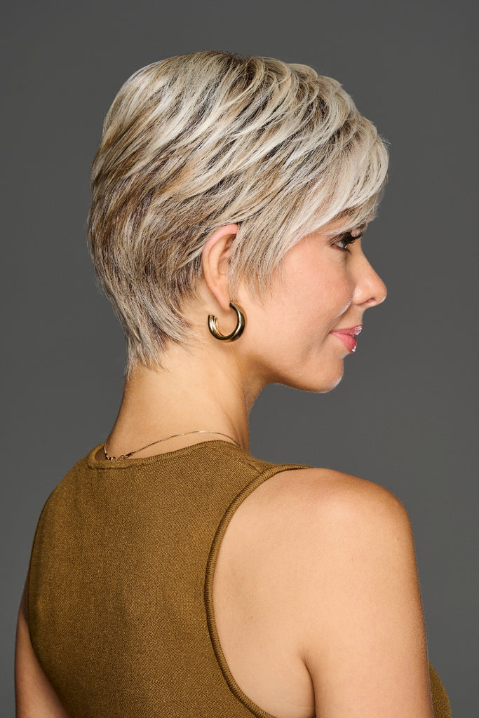 Side view of model wearing a wig by Gabor wig named Jaw Dropper.
