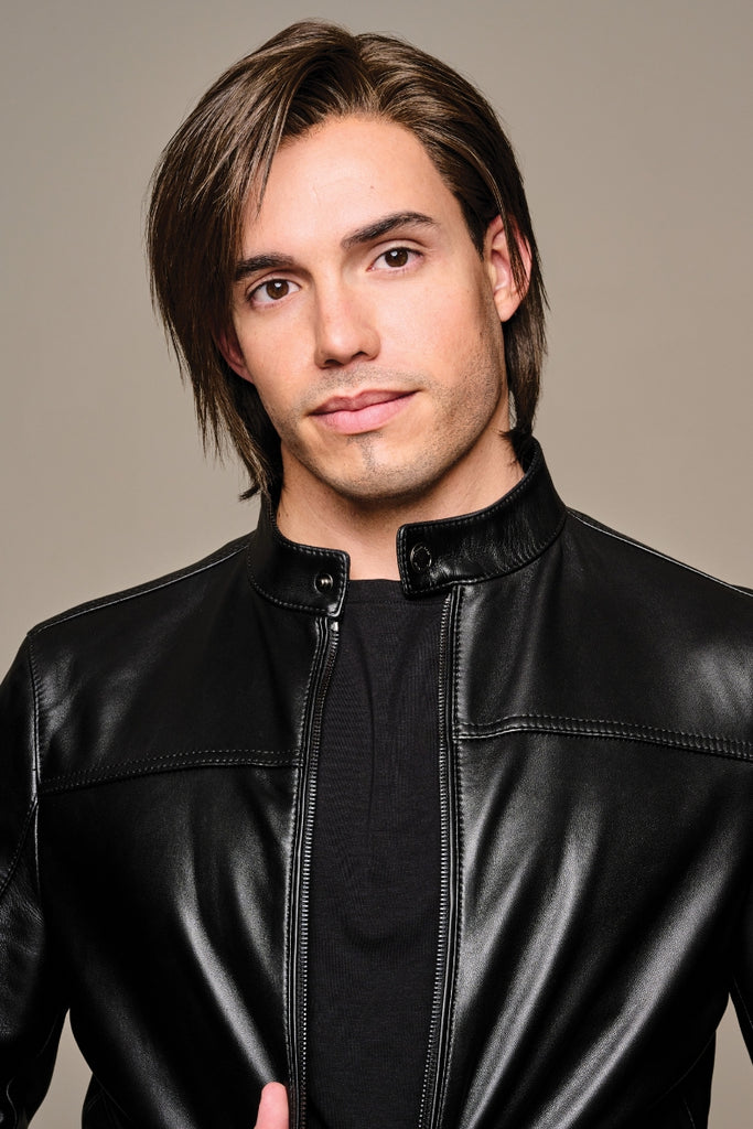 Close up of model wearing a medium length mens wig with layers.