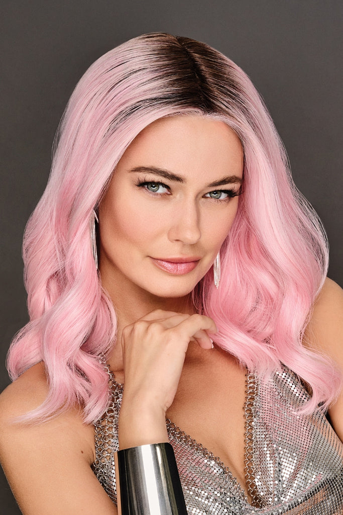 Woman styling How Pink It is by Hairdo Wigs in the color How Pink It Is.