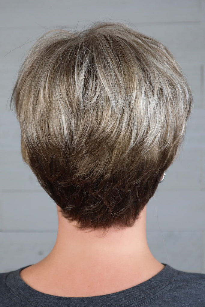 Back of Denise wearing a short pixie cut wig.