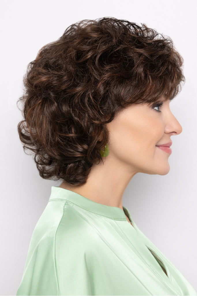 Side view of model wearing a Mane Attraction wig.