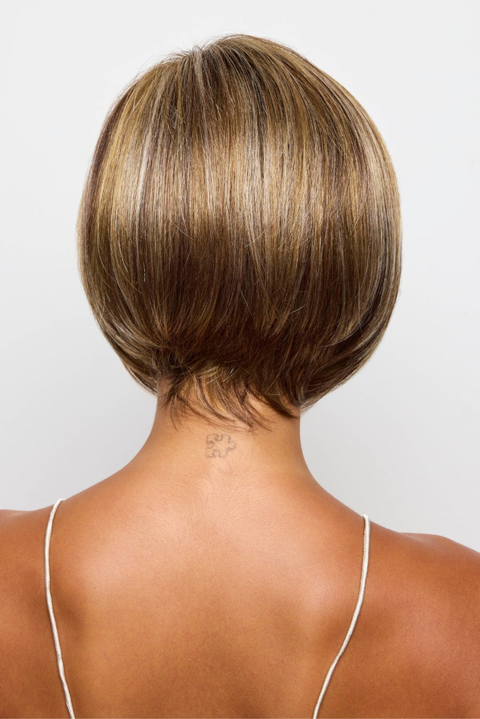 Back view showing the neck length tapered bob.