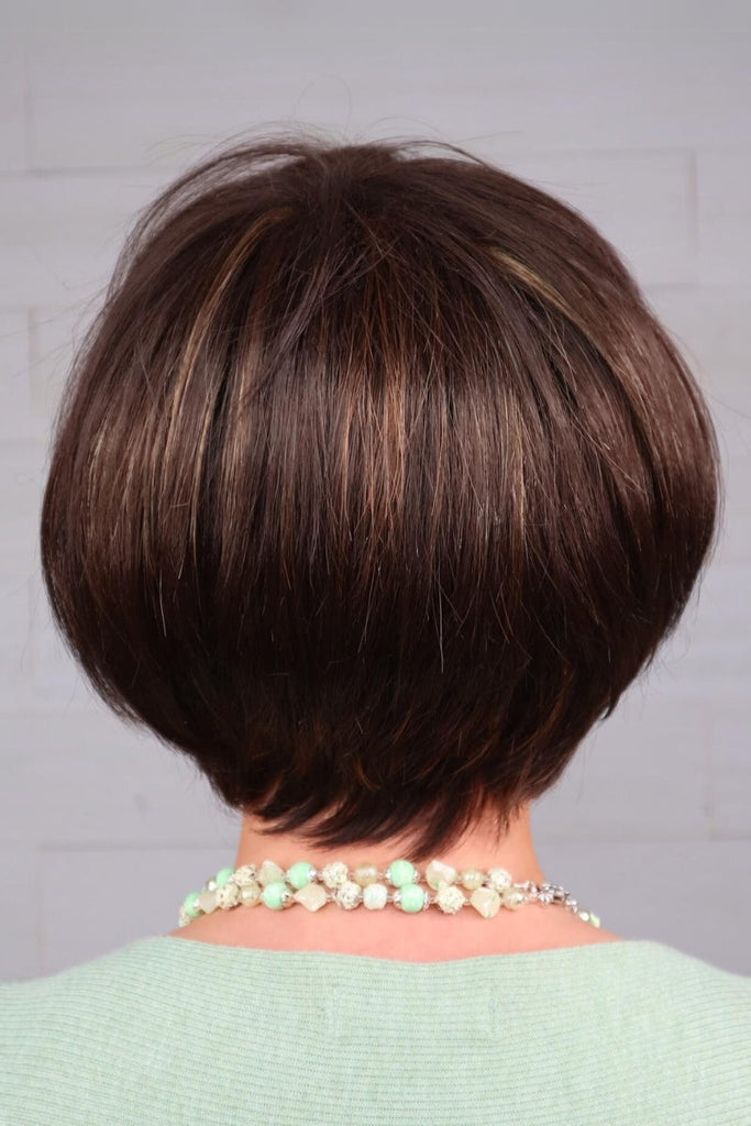 Back of pixie cut in the color coffee latte.