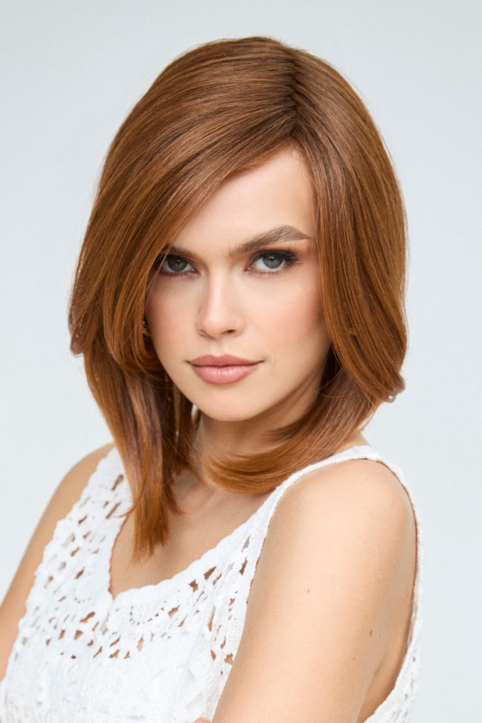 Model wearing a shoulder length wig.