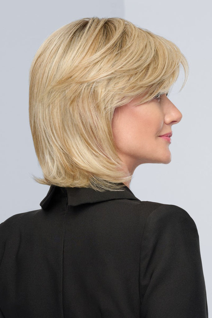 Model wearing Raquel Welch wig Black Tie Chic 10.