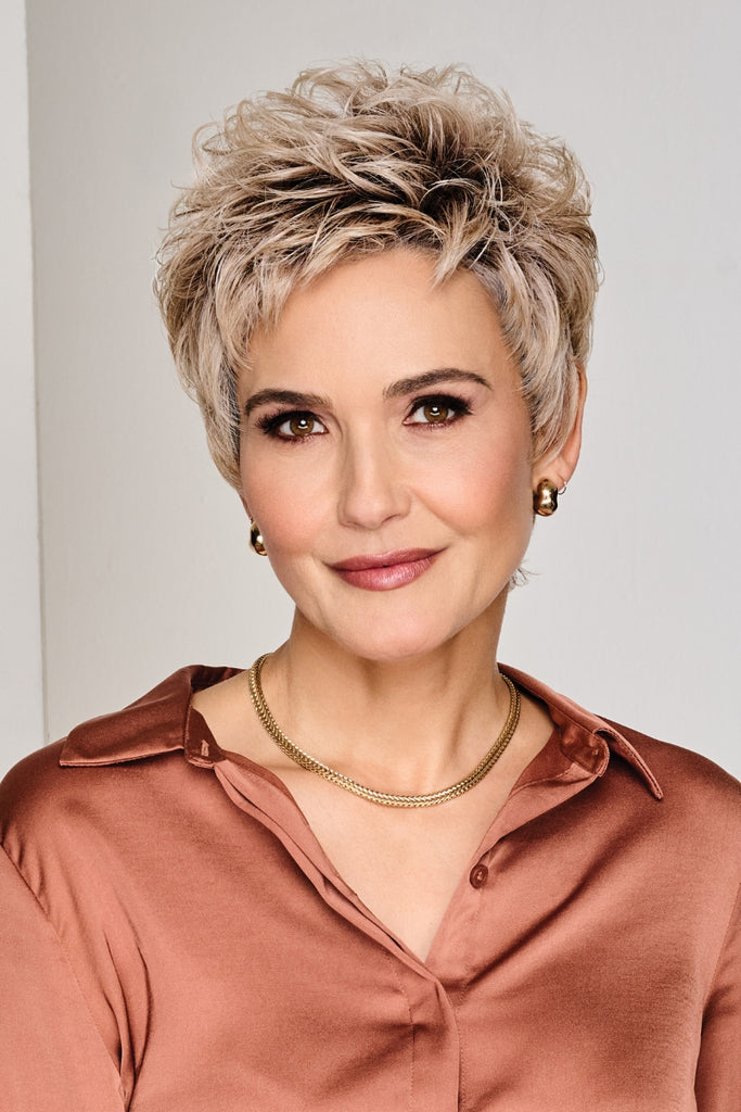 Model wearing a short pixie cut wig.