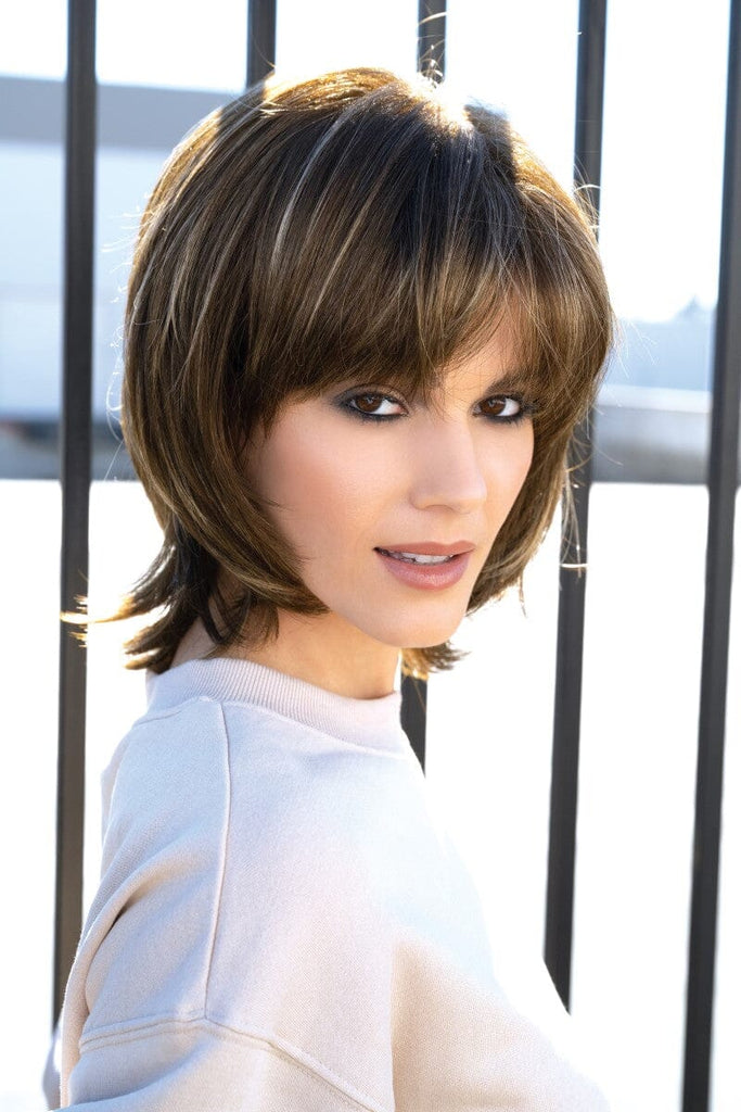 Model wearing the Rene of Paris wig Bailey #2346 1.