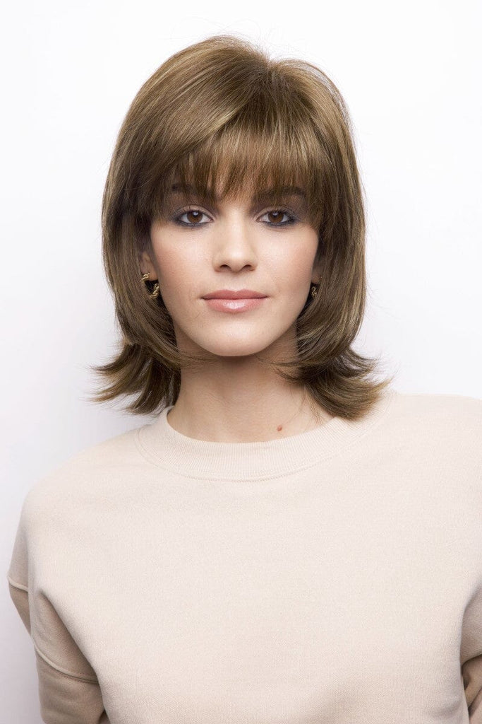 Model wearing the Rene of Paris wig Bailey #2346 2.