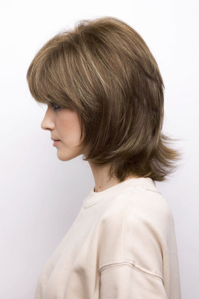 Model wearing the Rene of Paris wig Bailey #2346 4.