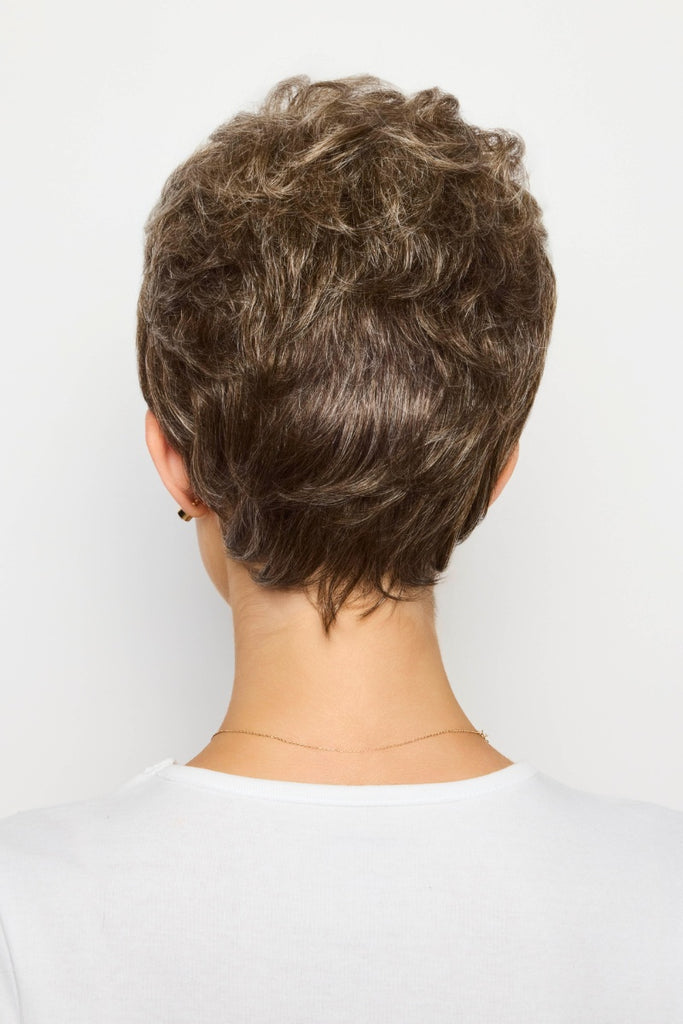 Back of model wearing a short wig.