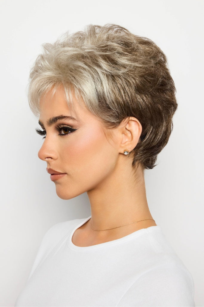 Side of model wearing a pixie cut wig.