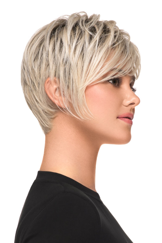 Woman wearing the short layered pixie. 