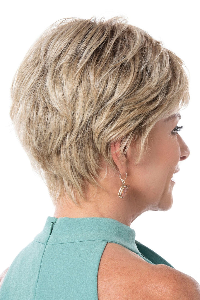 Side view of women wearing a short style with a more voluminous crown and sides.